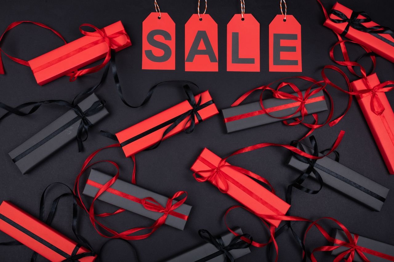 Home Bright gift boxes and sale tags, ideal for festive promotions.